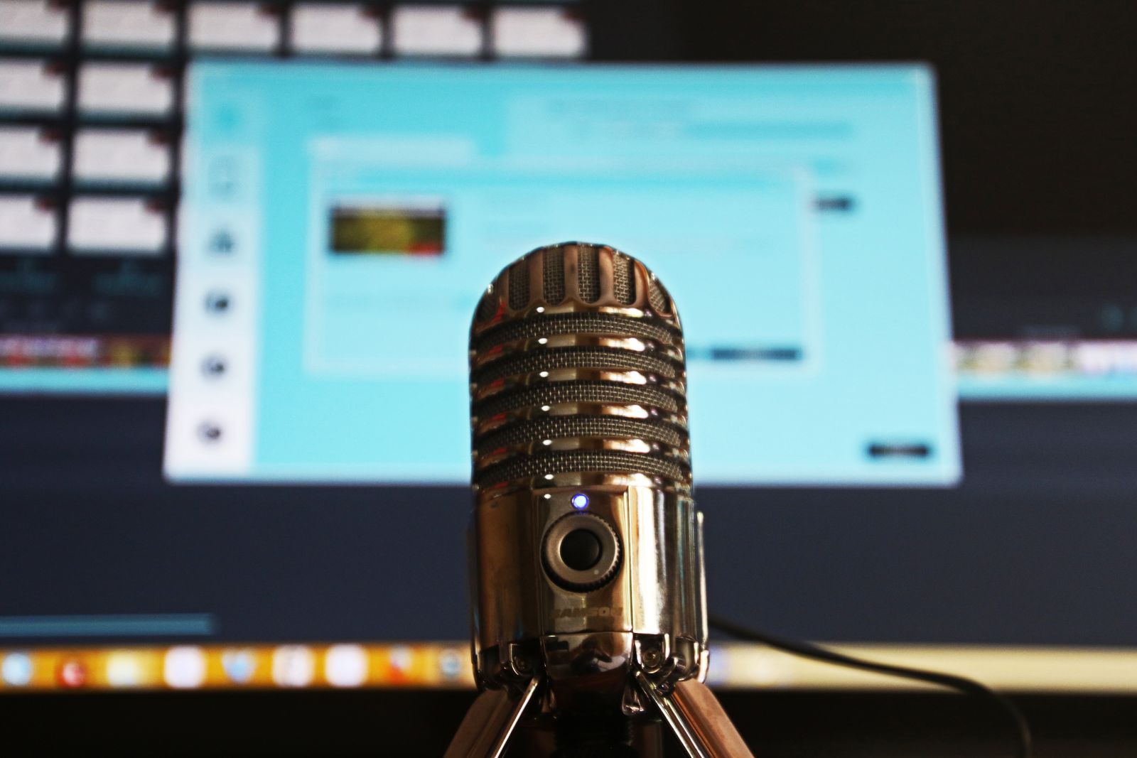 A mixing desk and headphones used to edit podcast audio